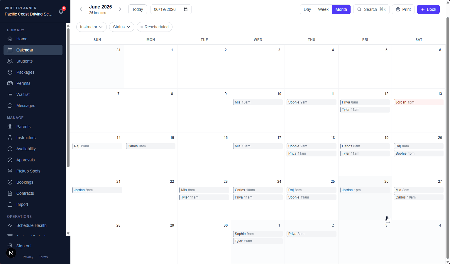 WheelPlanner month calendar showing a driving school's lessons across instructors.